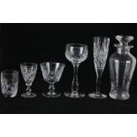 A large collection of Stuart glassware to include a cocktail decanter, five wine glasses, two