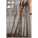 Eight various polo sticks and two croquet mallets (NC)