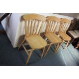 Three pine dining chairs with turned supports and legs