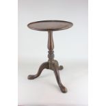 A mahogany wine table with carved pineapple shaped support on tripod base (a/f)