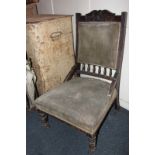 An Edwardian occasional chair with upholstered seat and back, on turned legs (a/f) (NC)