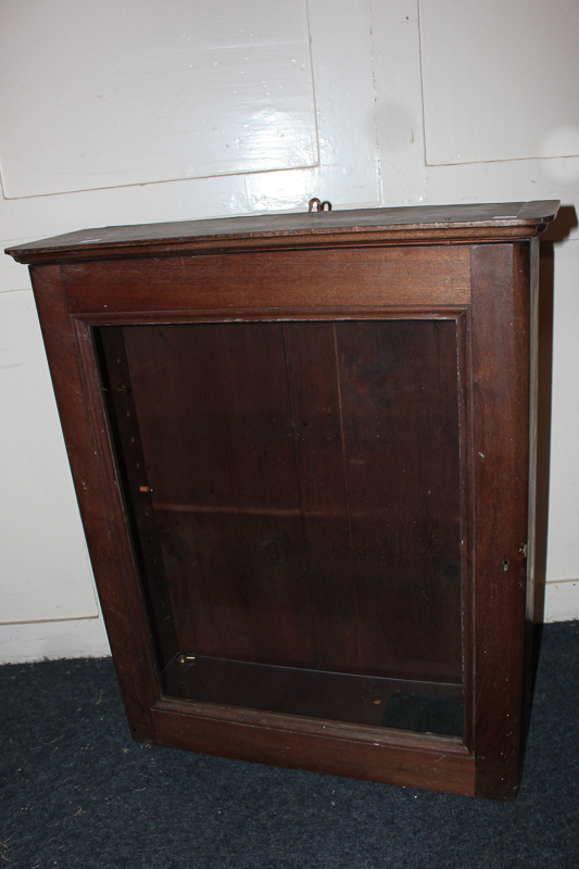 A mahogany wall cupboard with one glazed door enclosing two perspex shelves 66cm (NC)