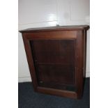 A mahogany wall cupboard with one glazed door enclosing two perspex shelves 66cm (NC)