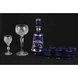 A blue Venetian glass liqueur decanter with six matching glasses with silver decoration of