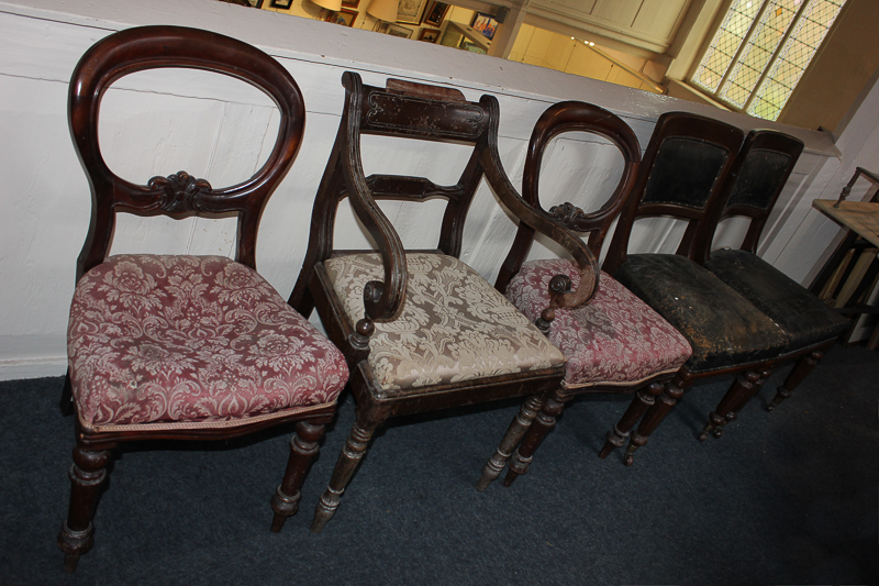 A pair of Victorian mahogany balloon back chairs, a pair of Edwardian chairs with leather covered