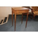 An oak side table with single drawer, on square tapered legs, 49cm