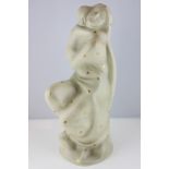 A Lenci ceramic figure of a mother and child, decorated with gilt stars, impressed name to base,