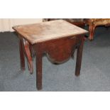 An early 20th century mahogany commode with lift-up flap top which becomes the back support, with