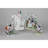 Four Staffordshire pottery flat-back figures including 'Princess' on horseback, lovers in foliage