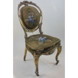 A 19th century French gilt gesso framed chair with original bead work back and seat on cabriole