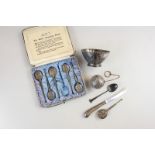 An Edwardian silver dish, a set of five silver copies of The Anointing Spoon in fitted case (one a/