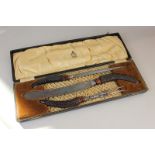 An antler handled carving set in fitted case, by George Butler & Co, Sheffield