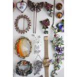 A floral enamel and paste set necklace, a collection of costume jewellery including brooches,