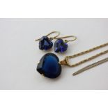 A heart shaped blue stone pendant in 18ct gold on rope twist neck chain; a pair of similar drop