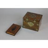 A brass mounted oak veneered casket with glass liner, together with a wooden box shaped as a book