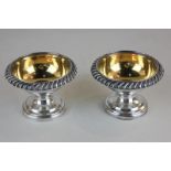 A pair of Georgian silver plated salts with gilt interior