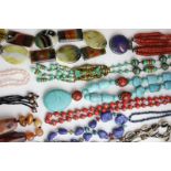 A collection of twenty various bead necklaces