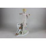 A Royal Dux porcelain figure of a nude girl running with dog, 36cm high