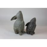 Two metal models of rabbit characters with noses raised upwards, 20cm and 16cm high, (SPM)