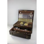 An oak cased canteen of Sheffield silver plated cutlery for twelve