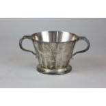 A George V silver two-handled mug, maker Tiffany & Co, London 1924, monogrammed, 9.5oz, with faceted