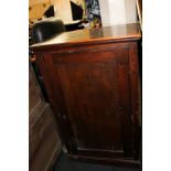 A stained pine cupboard with single door, on plinth base, 65cm, (SPM)