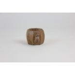 A Robert Mouseman Thompson oak napkin ring with eight curved sides, 4cm high