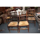 A matched set of six oak framed rush seat chairs