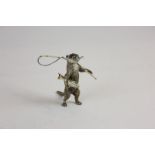 An Austrian cold painted bronze otter walking on hind legs with a fishing rod over one shoulder