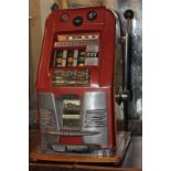 A Sega Bell one armed bandit fruit machine by repute from Southend Pier, 66cm high (converted from