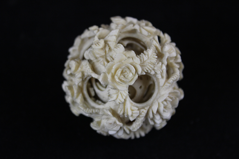 A 19th century Chinese ivory puzzle ball on stand, the ball carved with floral decoration (a/f), the - Image 3 of 3