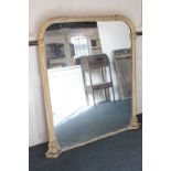 A large gilt wood and gesso overmantle mirror, 109cm by 132cm, (NC)
