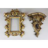 A Florentine frame of gilded carved wood and gesso (to hold an 11cm by 15cm picture), together