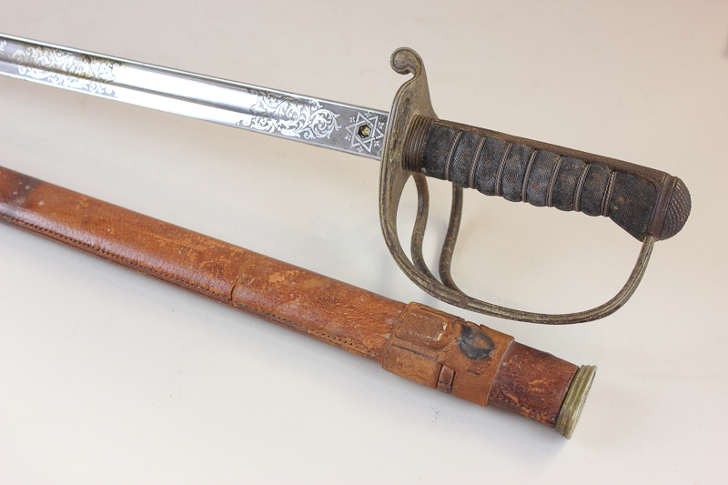 A George V Army Service Corp officer's sword with 85cm etched straight blade in leather scabbard, (