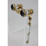 A pair of 19th century opera glasses with mother of pearl inlay and floral decoration