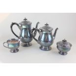 A four piece Sheffield silver plated tea and coffee set with reeded lids and bodies