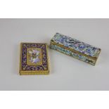 Two enamel and gilt boxes, one decorated with cherubs with a rich blue border, the other in bright