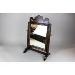 A 19th century mahogany framed swing toilet mirror with moulded gilded edge, 32cm