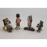 Three Austrian cold painted bronzes of cats, one dressed as a Queen's Guard (with fur bearskin), a