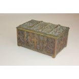 A bronze casket with Gothic style religious panel decoration, stamped Waterloo to inner rim, by