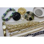 A quantity of costume jewellery including a gold mounted hardstone brooch