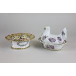 A Continental porcelain pot, the lid modelled as a chicken, together with a Continental inkwell with