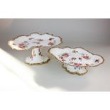 Two Hammersley porcelain comports with hand painted floral motifs and gilt embellishment, in