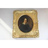 19th century school, portrait of a seated lady, oil on canvas, oval mount, 32cm by 27cm