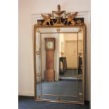 A fine gilt wood and gesso wall mirror with griffin surmount (a/f), panelled glass border with