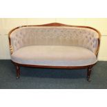 A small tub shaped Victorian/Edwardian settee with button back on turned legs,126cm