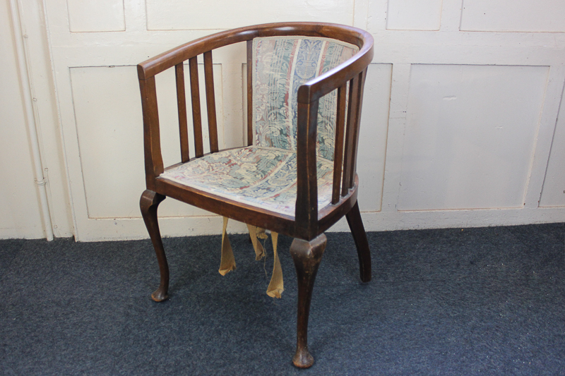 A  mahogany framed tub chair with upholstered back and seat, on cabriole legs, (SPM)