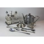 A silver plated six glass bottle cruet, a silver plated teapot and other items