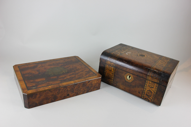 A brass inlaid burr walnut box containing draughts, dice and dominoes, together with an inlaid