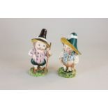 Two Staffordshire pottery figures of Mansion House dwarves, both well decorated in bright enamels